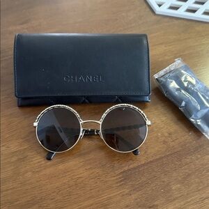 CHANEL Gold Frame Round Sunglasses with Black Case